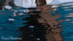 www.carissadumond.com - Carissa in the white sheer micro bikini and snorkel in the pool (no mask!) thumbnail